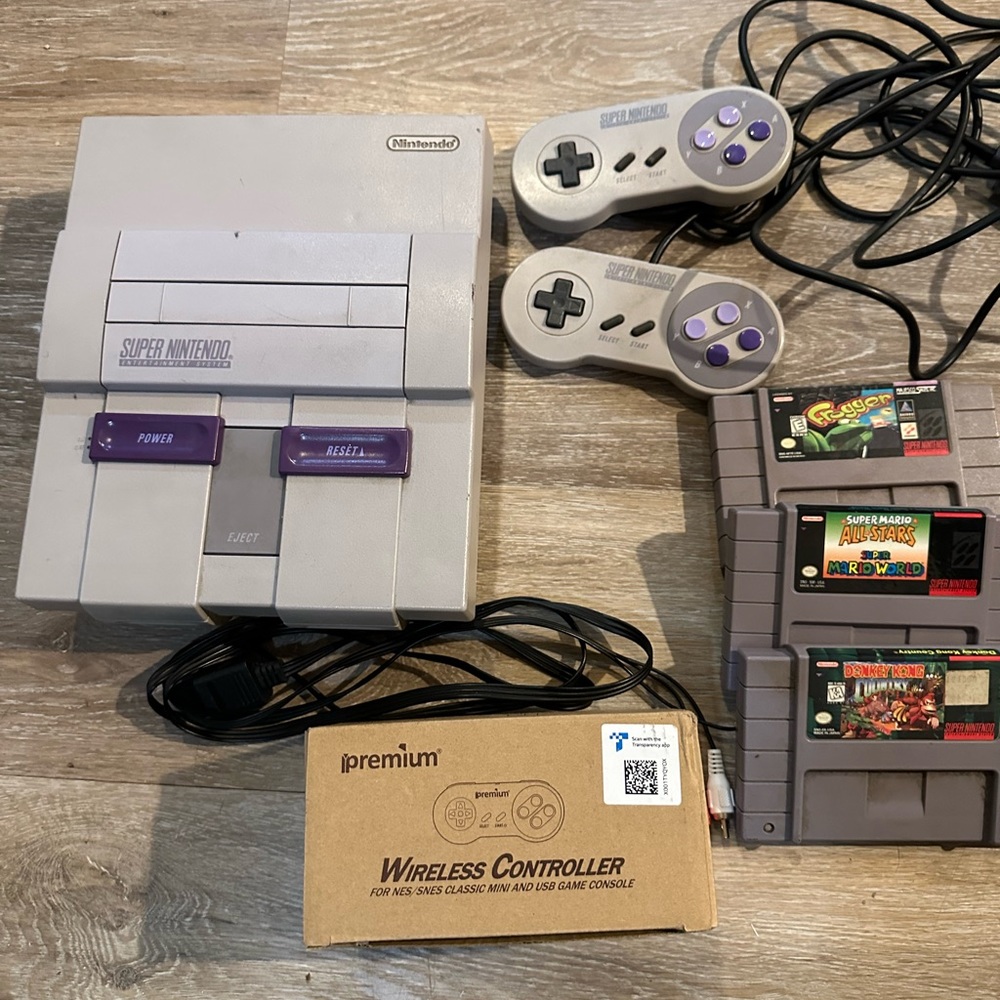 Original Super Nintendo w/ games, remotes, and Wireless Controllers